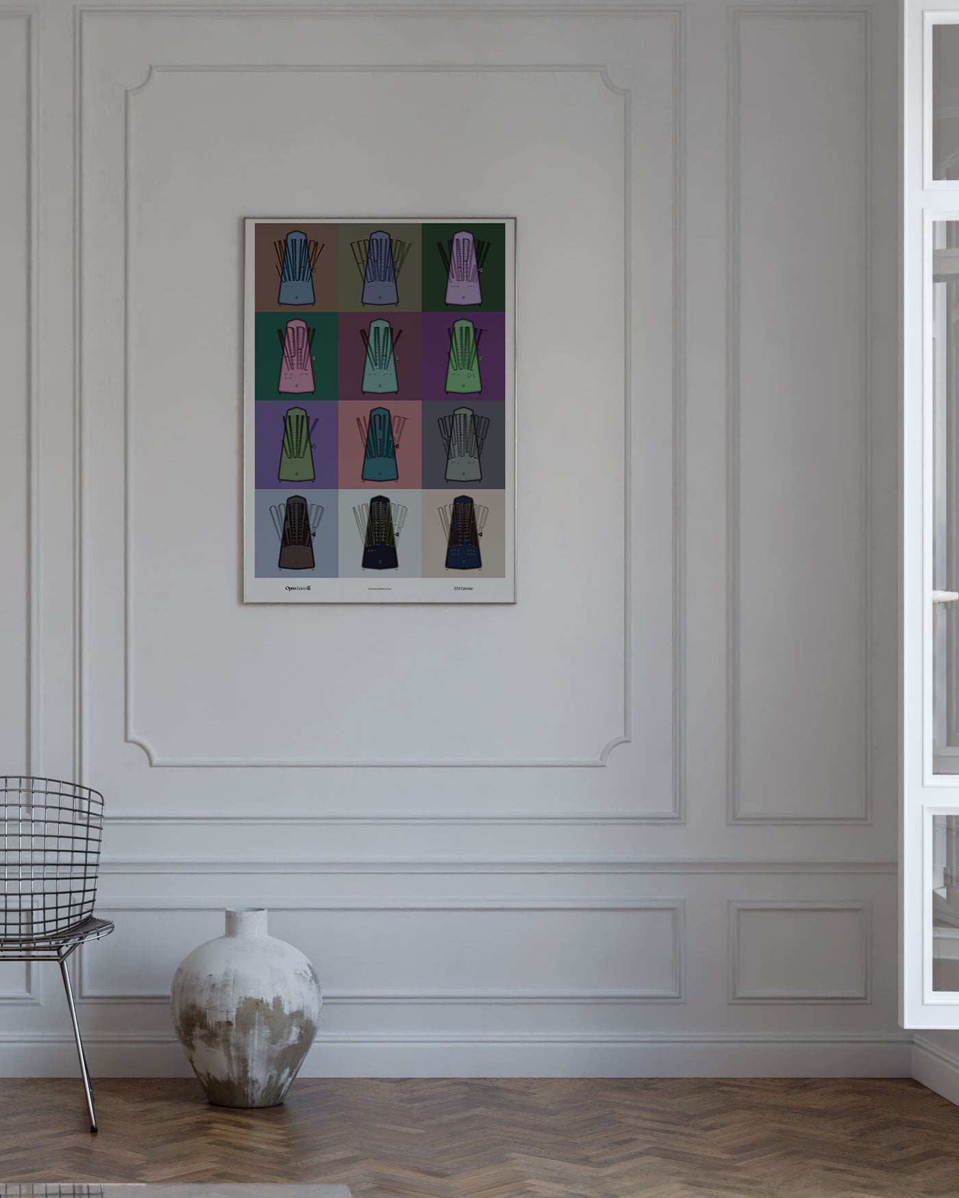 Modern interior with a colorful metronome calendar art print on a white wall,