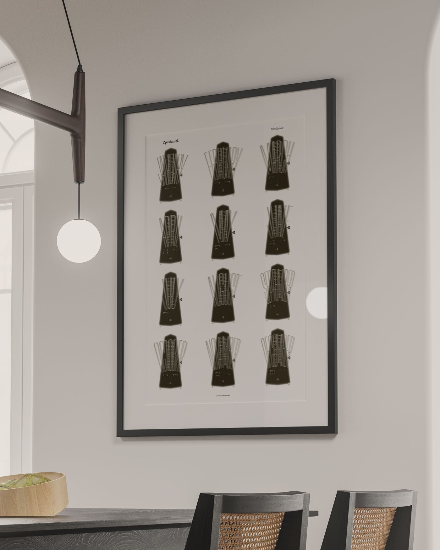Brown and white 2026 wall calendar inspired by metronome, art print framed on wall