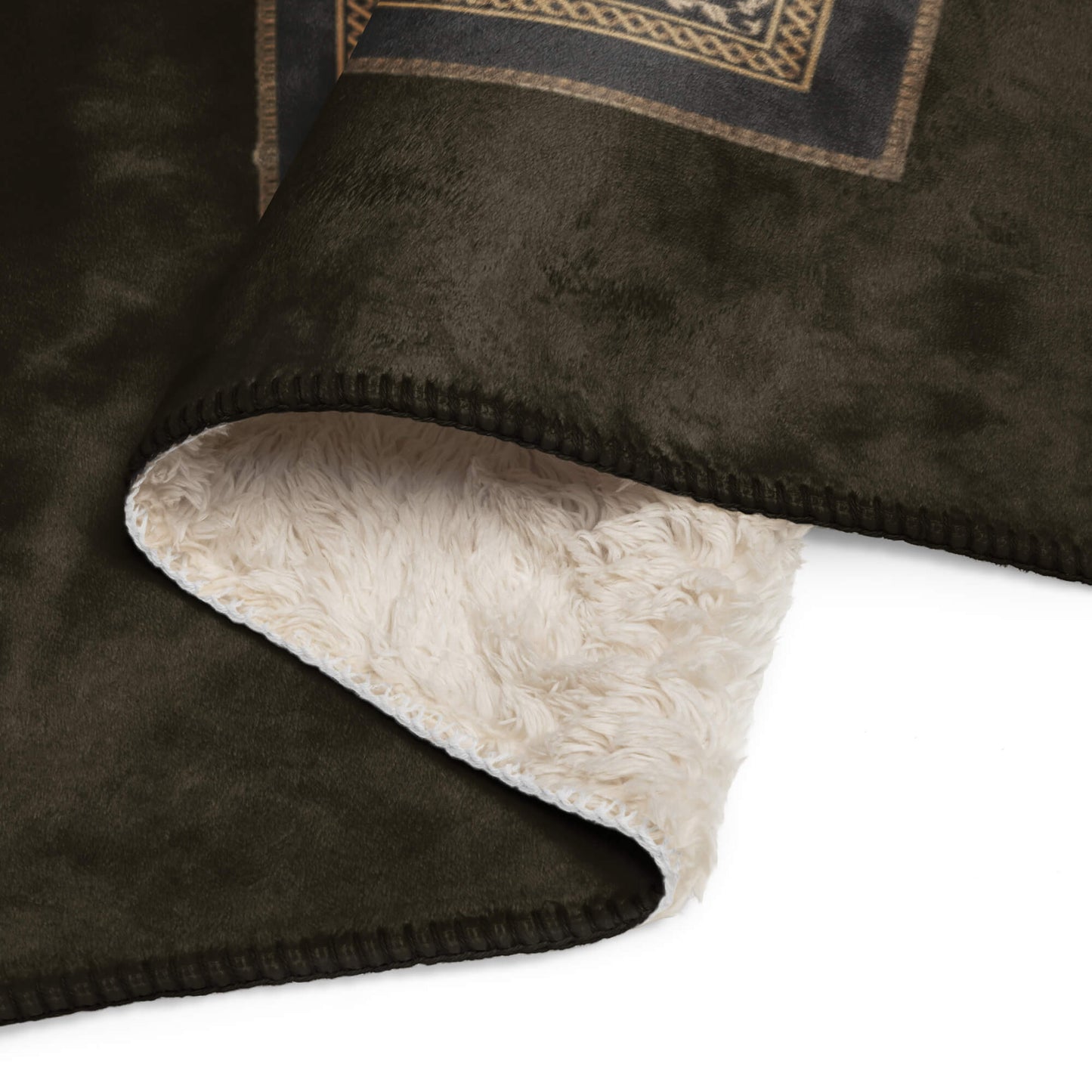 Brown blanket with beige fleece lining on a white background